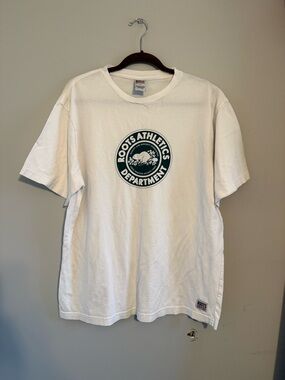 Roots White T-Shirt with Green Athletics Department Logo